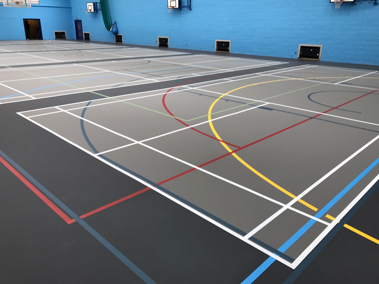 Pulastic multi-use sports floor installation with court markings for indoor Leisure Centre and school Sports halls