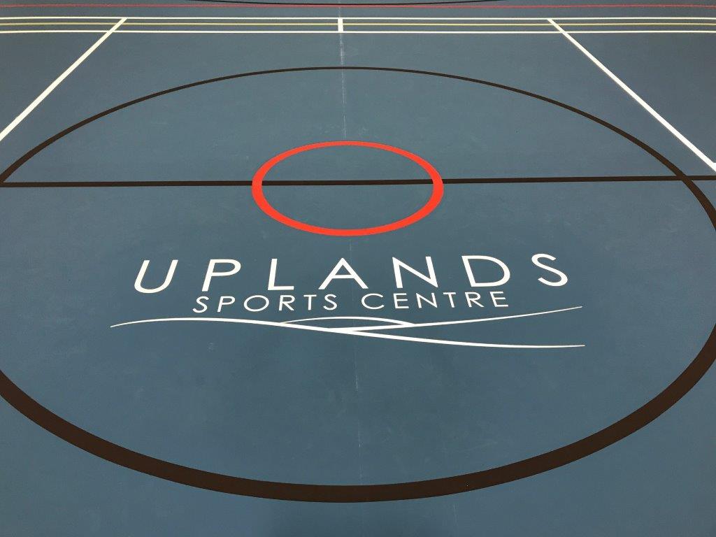 Sports centre sports hall installation of pulastic floor with Logo and court markings