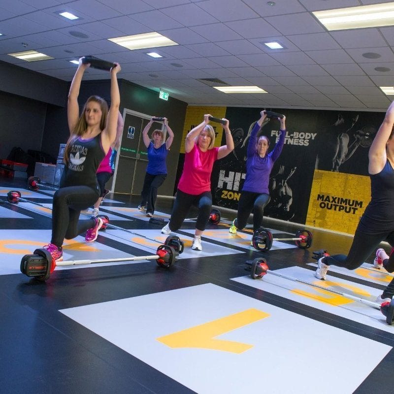 Fitness class using Indoor Vinyl sports flooring by Sports Surfaces UK