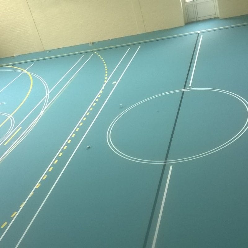 Installation of Pulastic Sports hall floor with court markings by Sports Surfaces UK