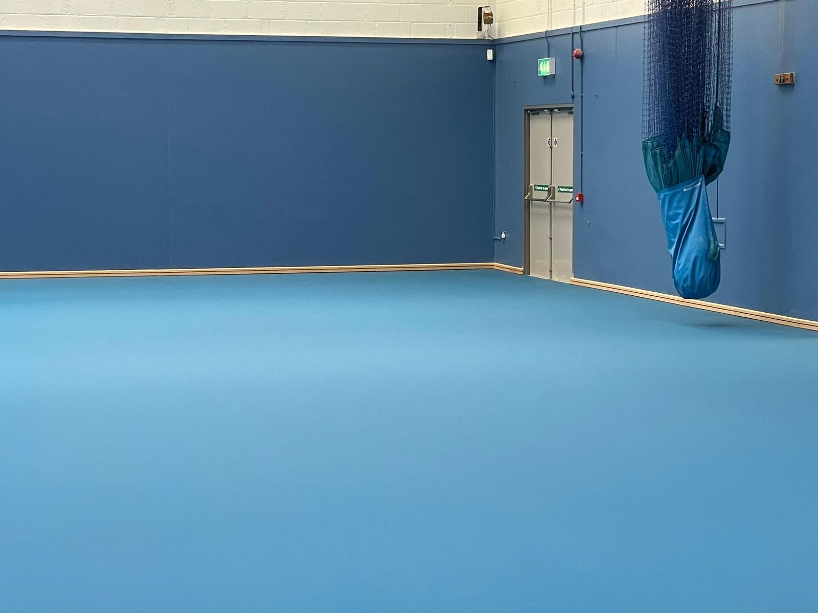 Complete with skirting boards - Pulastic Indoor sports floor overlay -refurbishment service